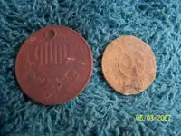 shield nickle and kansas tax token.webp