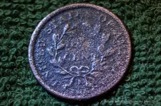 Back of 1-2 cent.webp