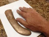 brass object from beach 5.webp