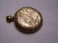 Pocket watch back after cleaned.webp