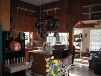 Kitchen and sunroom.webp