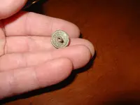 back of c&o button.webp