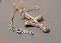 Silver cross pendant.webp