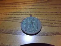 nat def medal 003.webp