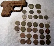 Gun & Coins.webp