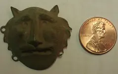 Lion head trade broach.webp