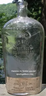 Bell James quart Whiskey with label.webp