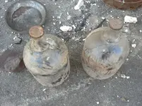 gallon jugs of oil.webp