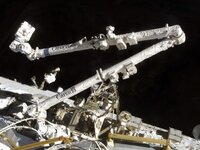 the-canadian-built-space-station-remote-manipulator-system-canadarm2-during-undocking-activities.jpg