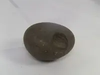 Nutting stone Side.webp