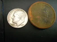 1952 rosi and dollar coin.webp
