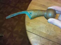 Curved brass handle 2.webp