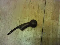 Curved brass handle 1.webp