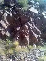 rocks on side of creek.webp