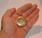gold watch2.webp