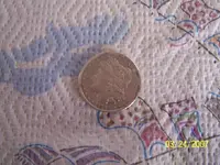 dollar coin front side.webp
