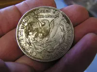 1921 capped dollar 2.webp