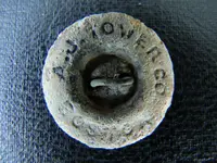 AJ Tower Button.webp
