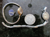 half dollar and watches.gif half dollar and watches.gif