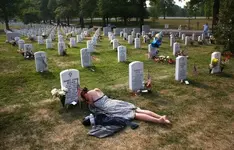 Arlington-National-Cemetery-Memorial-Day-John-Moore-Getty-Images-74345339-e1337978526107.webp