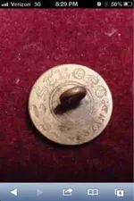 backmark_flatbutton_OldEnglishScript_BestStrong-standard_TN_photobyFano169.webp