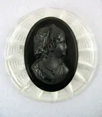 clear-bakelite-cameo-brooch.webp