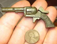 12 Site CP 052413 Sm Gun.webp