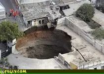 giant-sinkhole-behind-house.webp