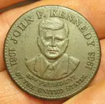 13 Sites CP SM G Wk of 061713 JFK Token Obv.webp