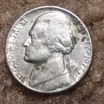 1977 nickel extra material on rev front.webp