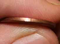 19xx cent with extra material on rim.webp