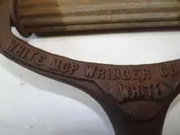 whitemopwringer.webp