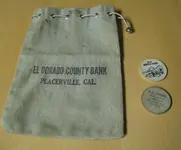 bank bag & wooden nickels.webp