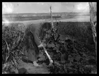 0086-0281-Hoeing-with-bone-hoe-cor.webp 0086-0281-Hoeing-with-bone-hoe-cor.webp