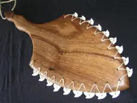 Shark_tooth_club.webp