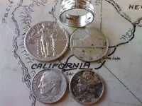 Four silver coins one.925.webp