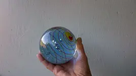 big 4 inch marble in hand.webp