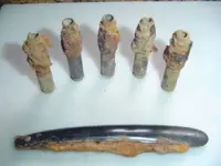 Bullet Shells and Straight Razor 1.webp
