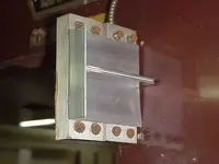 The Genius used this custom-made slab of aluminum to reposition the magnetic field away from ...webp