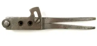 bulletmold_44ColtPatent_1850s_with-sprue-cutter_topview_TN_postedbyBosnMate.webp