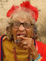1_1268236595_old-lady-smoking-a-cigar.webp