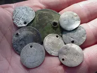 silver coins holed.webp silver coins holed.webp