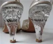 vintage-carved-lucite-and-rhinestone-high-heeled-shoes-300x249.webp
