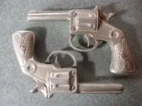 il_570xN.470489661_oqie cap gun.webp il_570xN.470489661_oqie cap gun.webp
