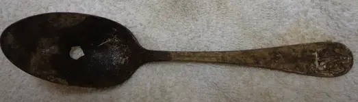 spoon hole dirty.webp