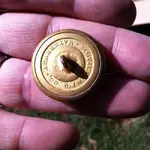 button_Old-English-C_Livery-button_1850s-era_ScovillMfgCoWaterbury-RMDC-backmark_backview_Ebay.webp