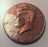 2001dKennedySinteredPlanchet.webp