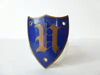 shield-emblem_Old-English-letter-U_thickly-enameled-background_Etsydotcom.webp