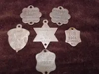 Dog tax tags.webp