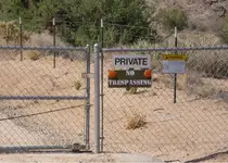 gate_prohibiting_entry_to_canyon_station.webp